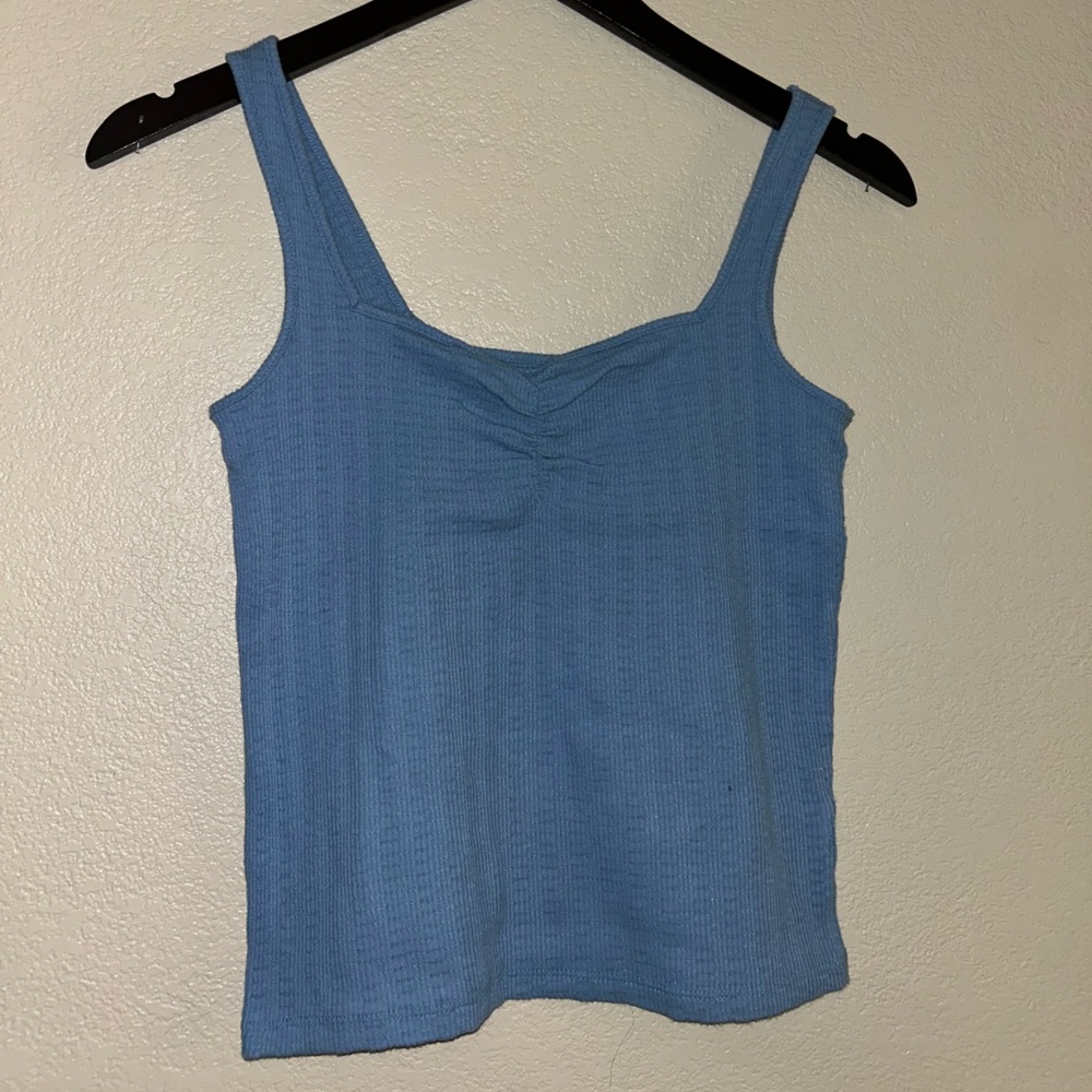 Blue tank top, ribbed chest